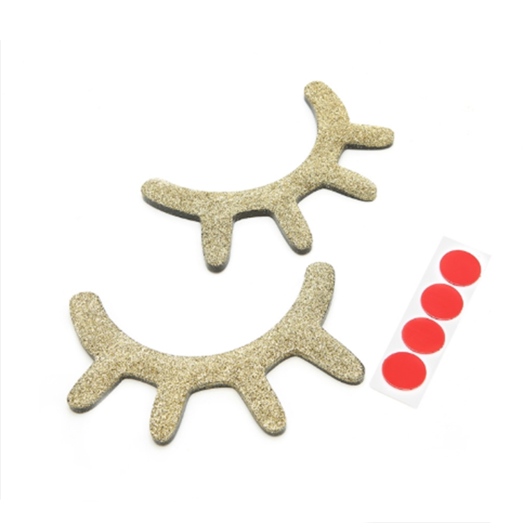 PESTAÑAS CON AUTOADHESIVO PARA PARED DORADAS X2